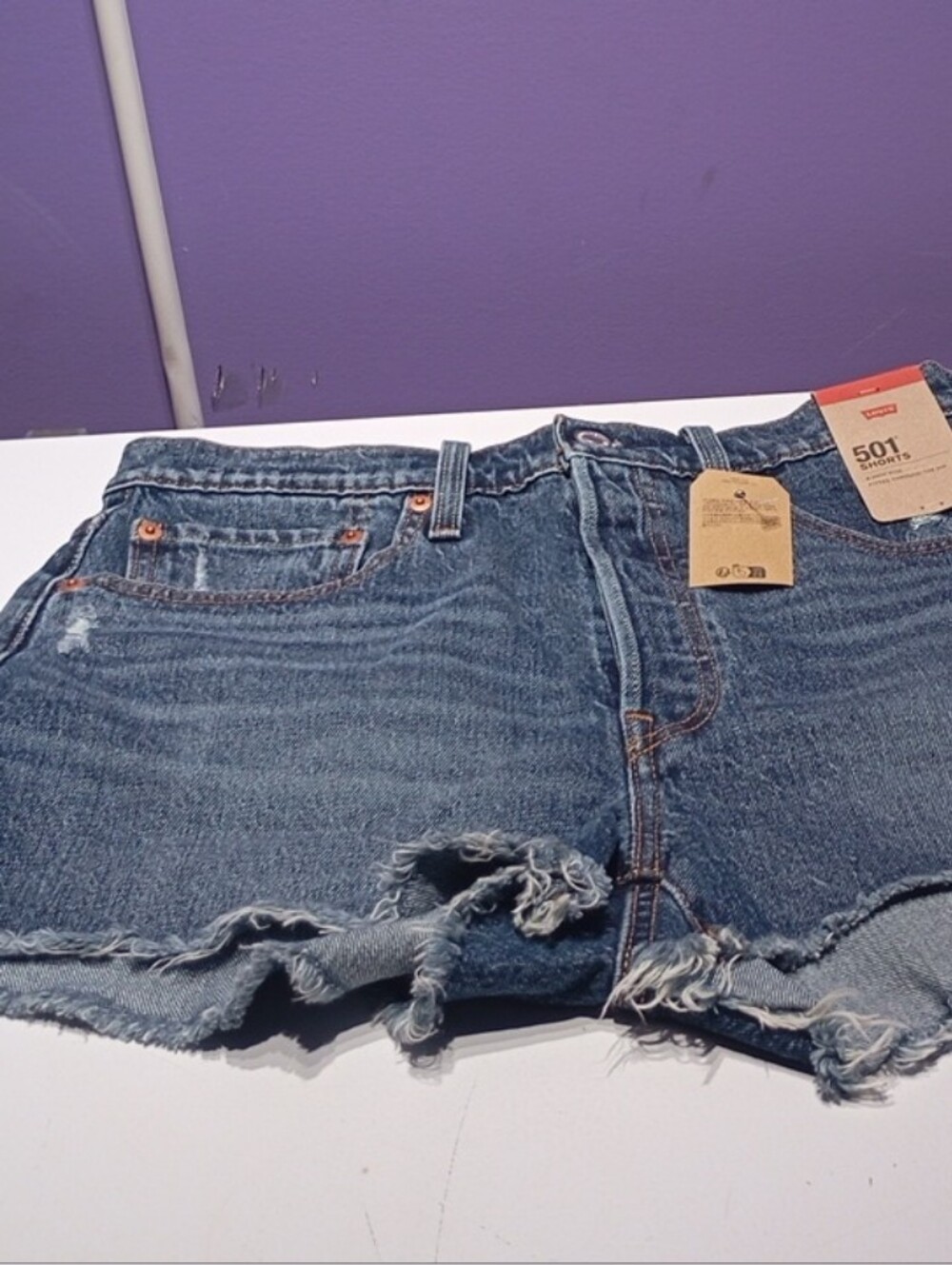 Women's Levi's Distressed Blue Denim Cutoff Shorts Size 30. 0002